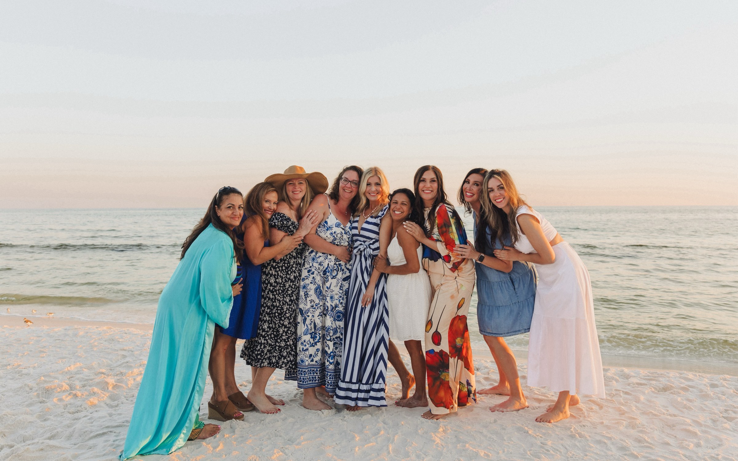 Women from INNERMOST together on the beach at 30A, Seaside, Florida